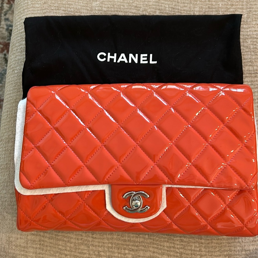 Chanel dark pink patent clutch bag